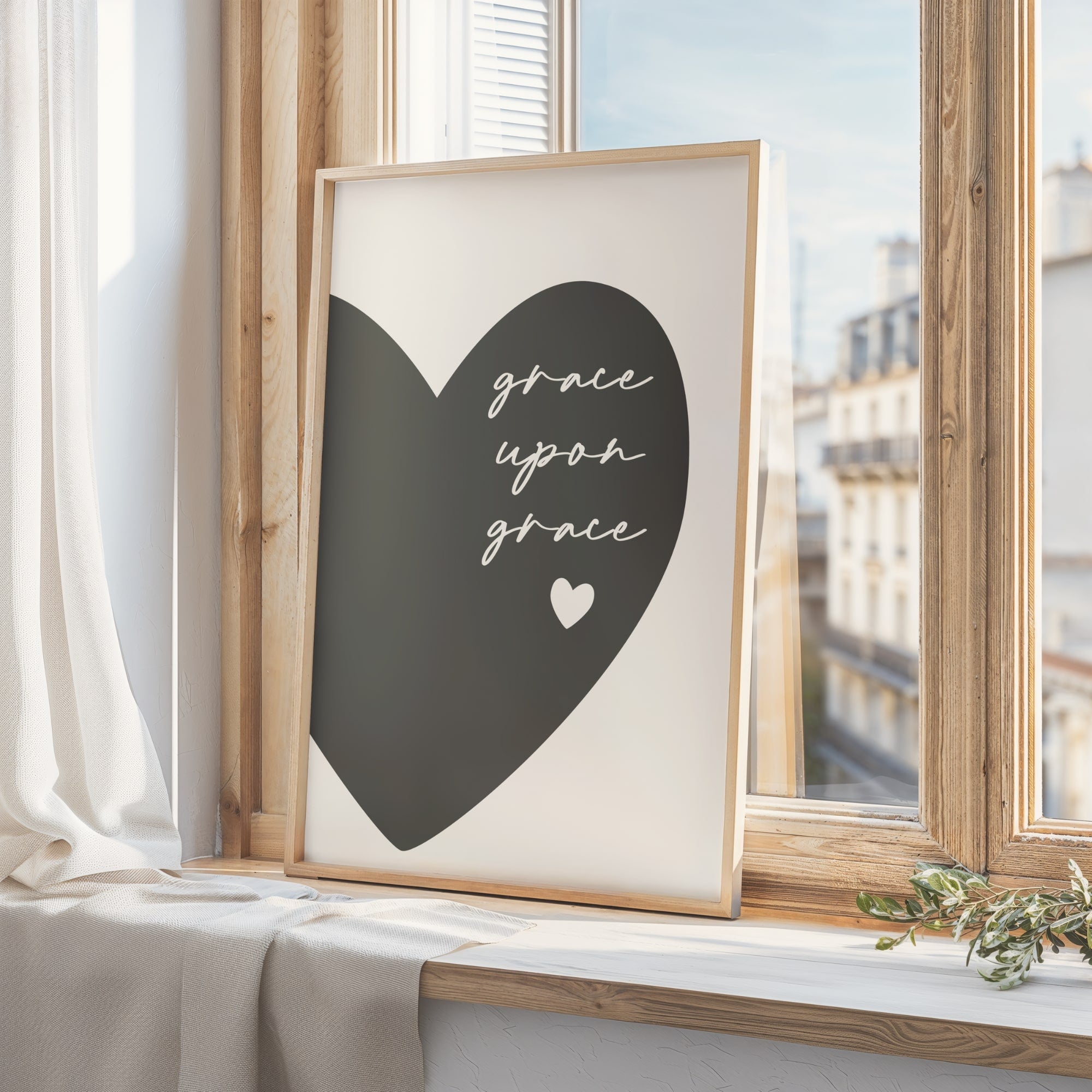 Inspirational Christian wall art featuring a charcoal heart design, uplifting Grace Upon Grace print for cozy bedrooms, nurseries, or living rooms.