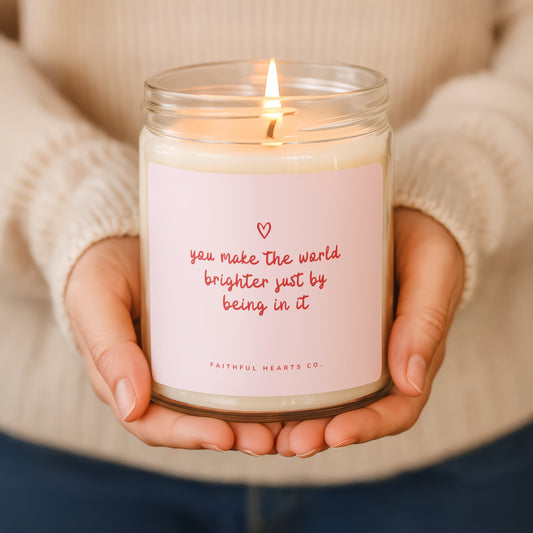 You Make the World Brighter Just by Being in It candle in clear glass jar, inspirational affirmation gift for her promoting kindness, love, and gratitude.