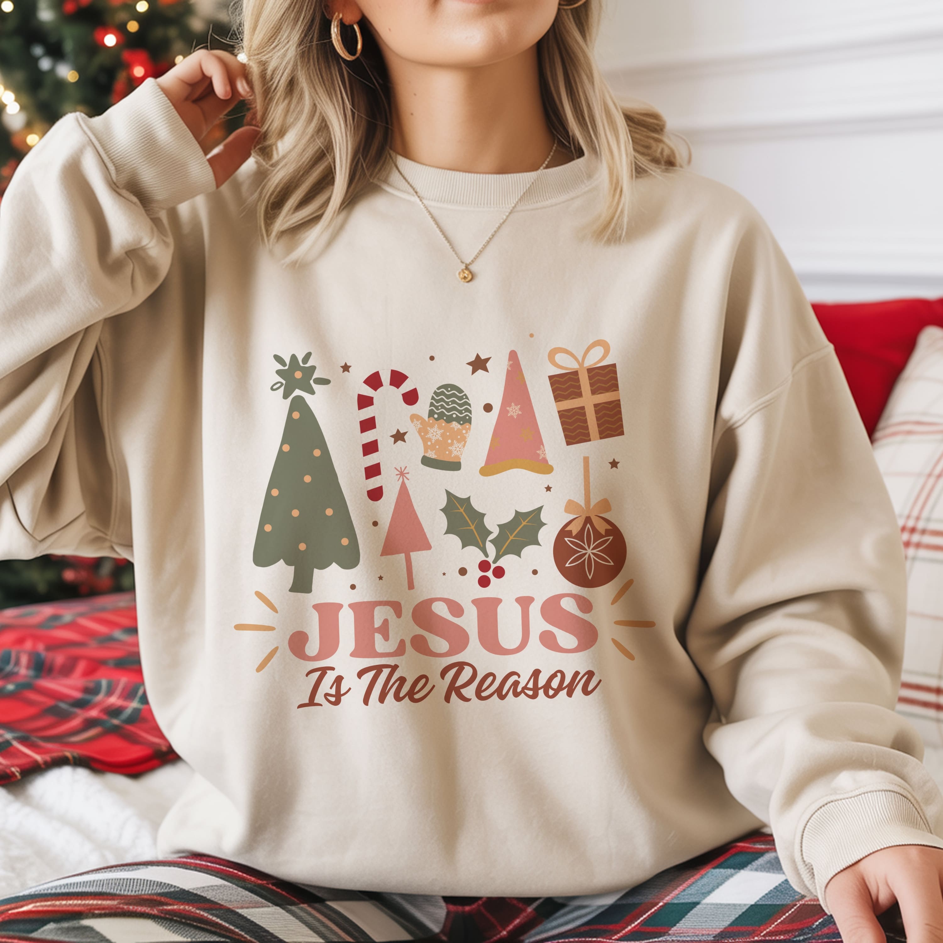 Jesus Is The Reason Christmas sweatshirt in sand with festive holiday graphics, women's Christian faith crewneck
