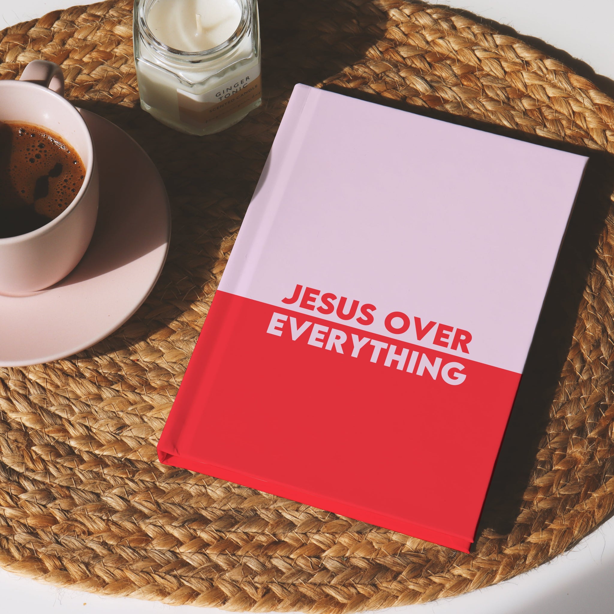 Modern pink and red Christian notebook for women “Jesus Over Everything” bold design