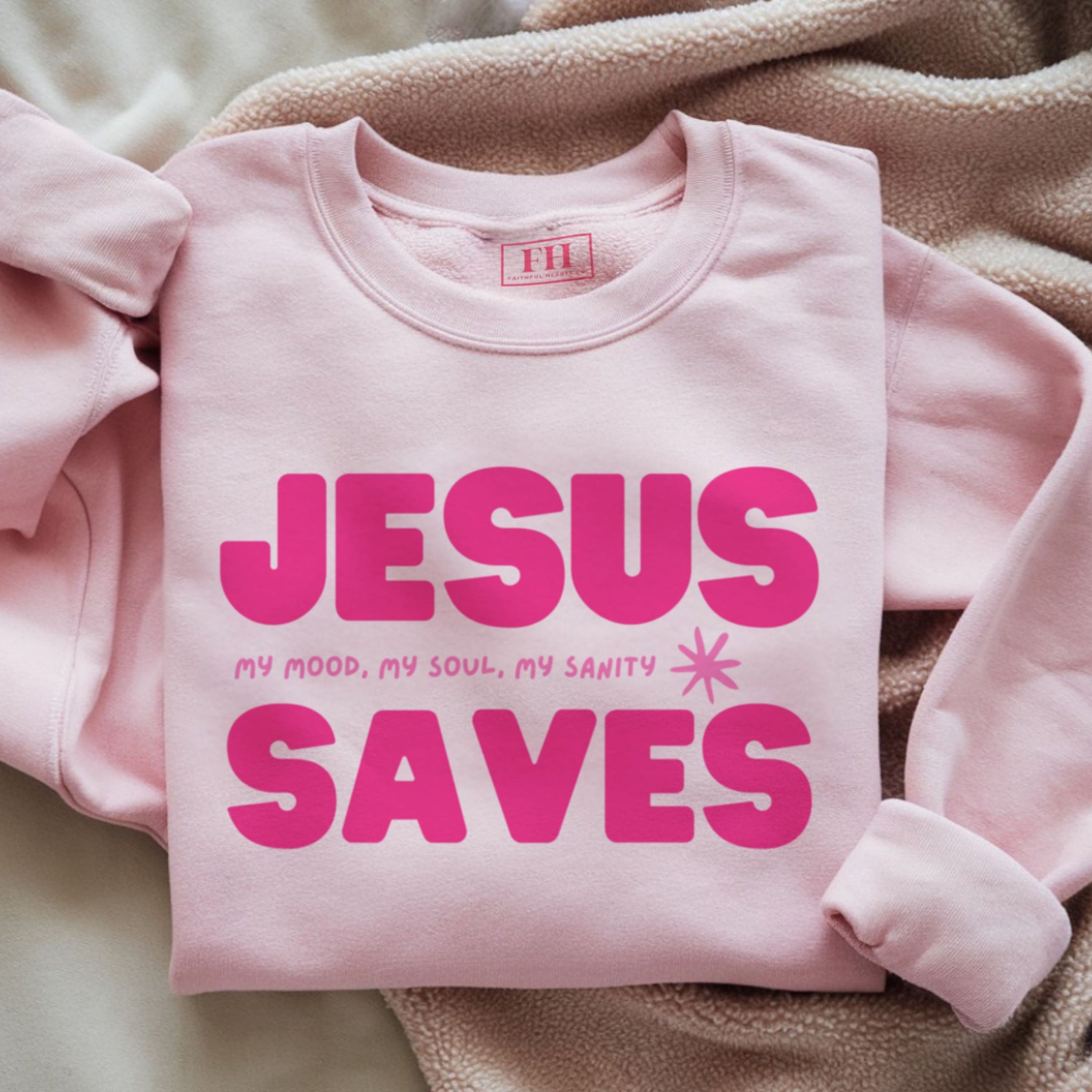  Jesus Saves crewneck sweatshirt in pink with hot pink lettering, women's Christian apparel by Faithful Hearts Co