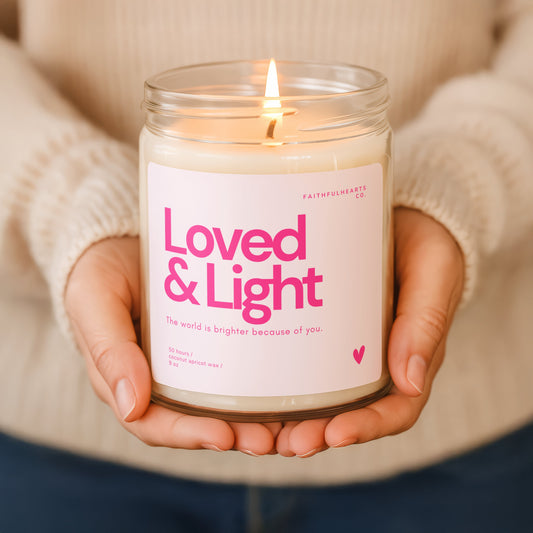 Loved & Light candle in clear glass jar, hand poured coconut apricot wax candle with uplifting message “The world is brighter because of you.”