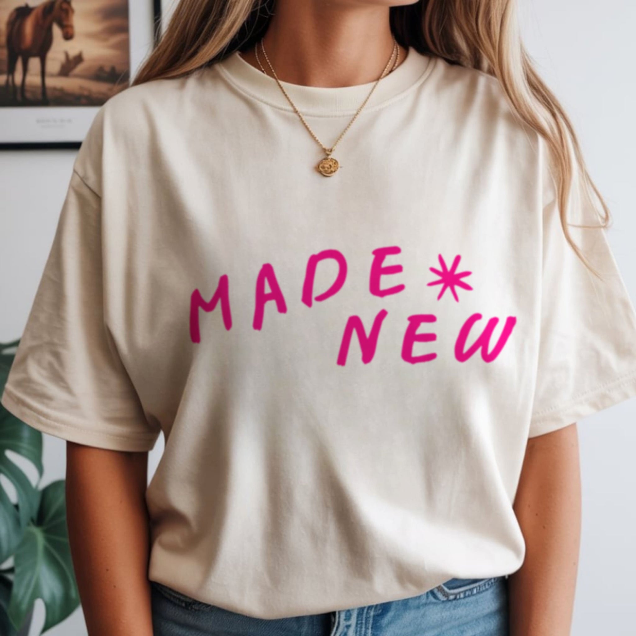 Made New Christian t-shirt in ivory with hot pink text, faith-based graphic tee for women, neutral new creation shirt