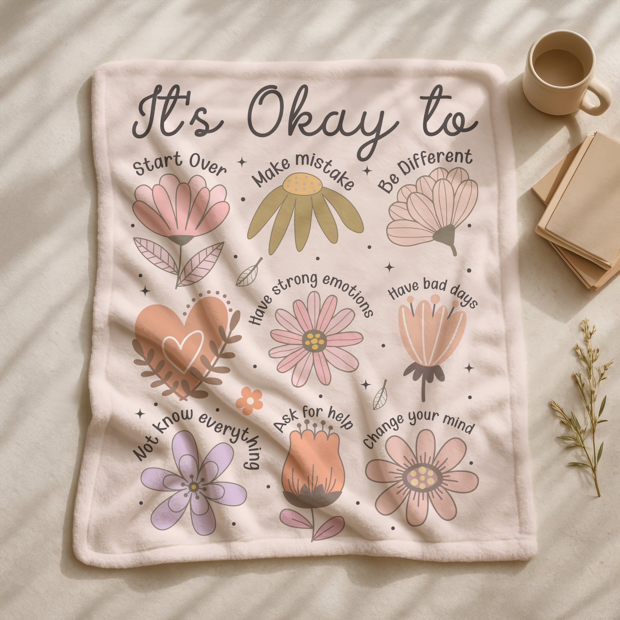 Positive affirmation blanket with “It’s ok to…” quotes and flower design