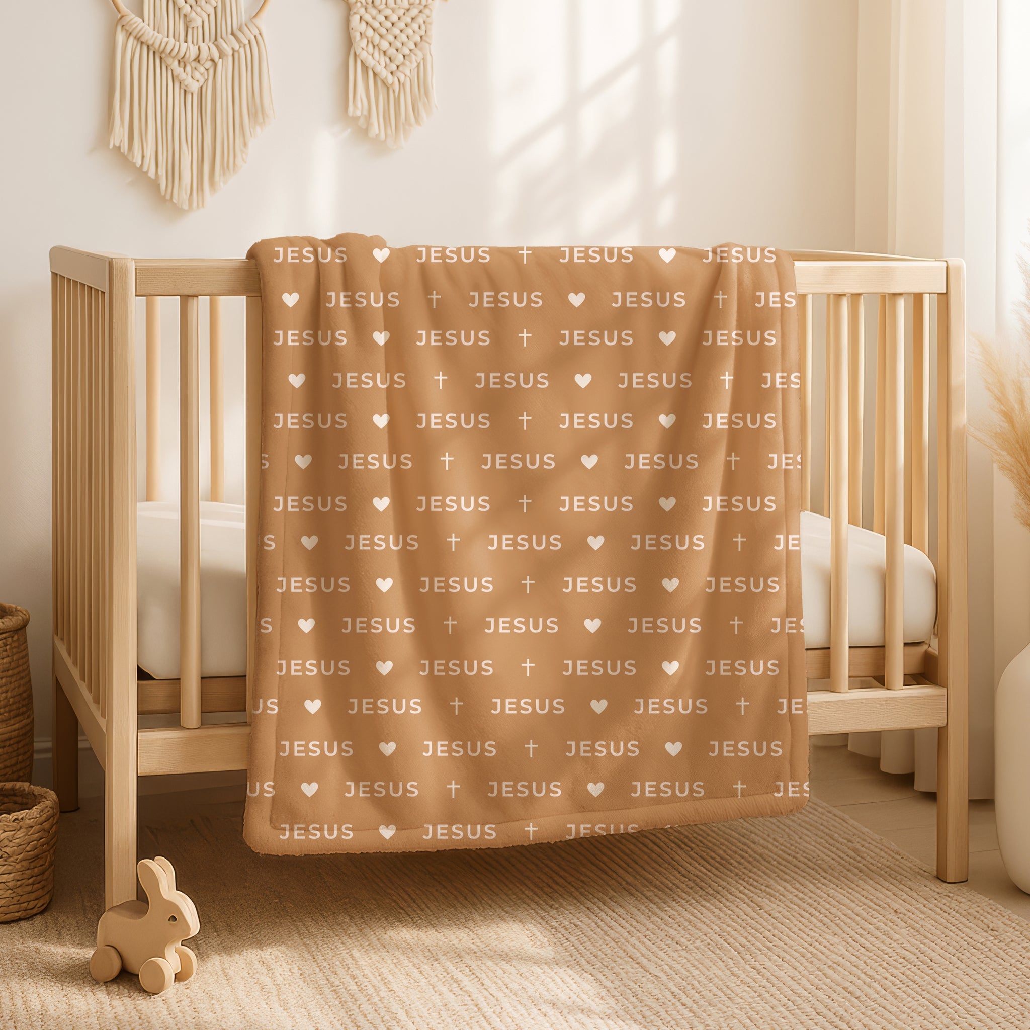 Modern caramel brown blanket with cream JESUS lettering in minimalist design