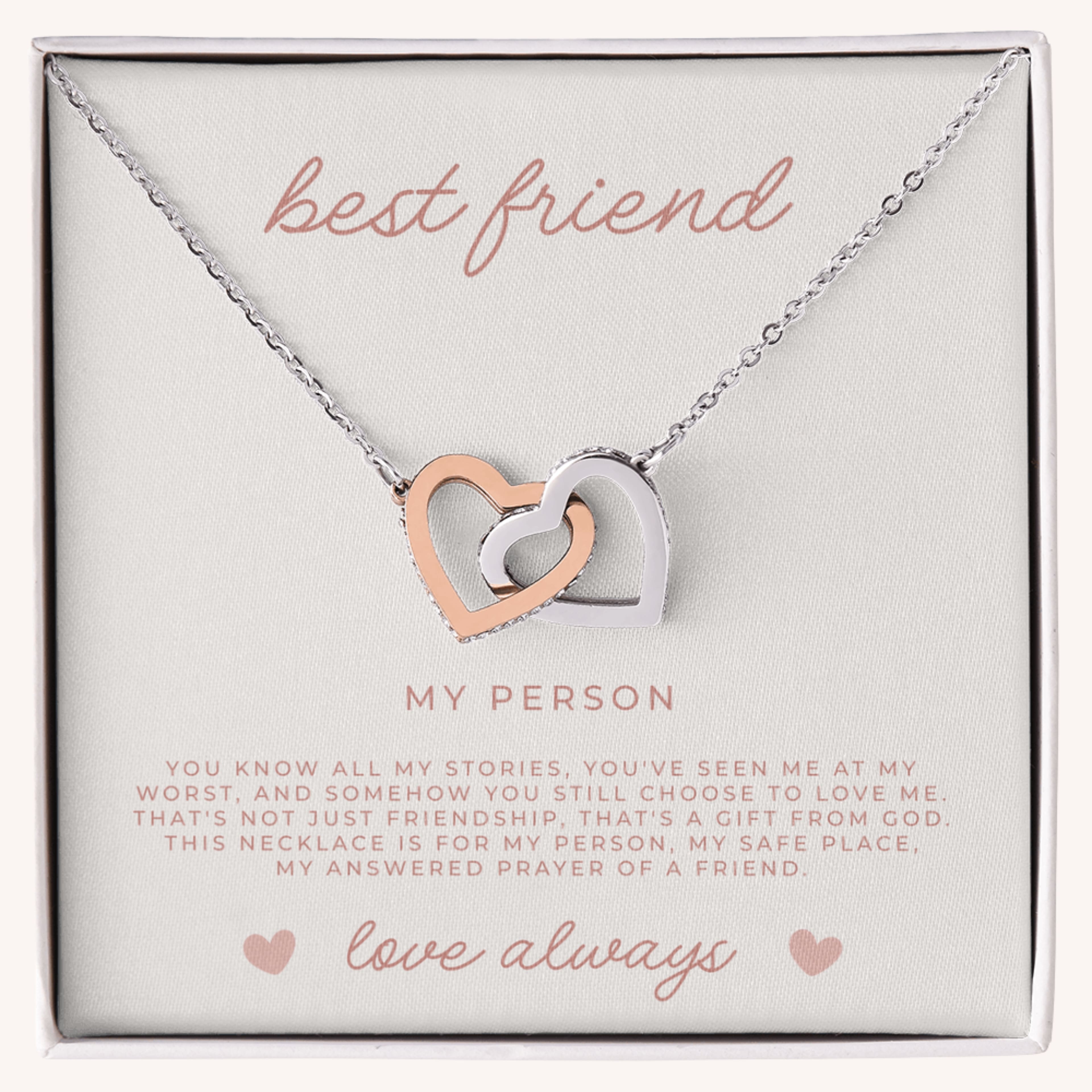 Necklace with interlocking heart pendants on a card with faith filled, message with prayer