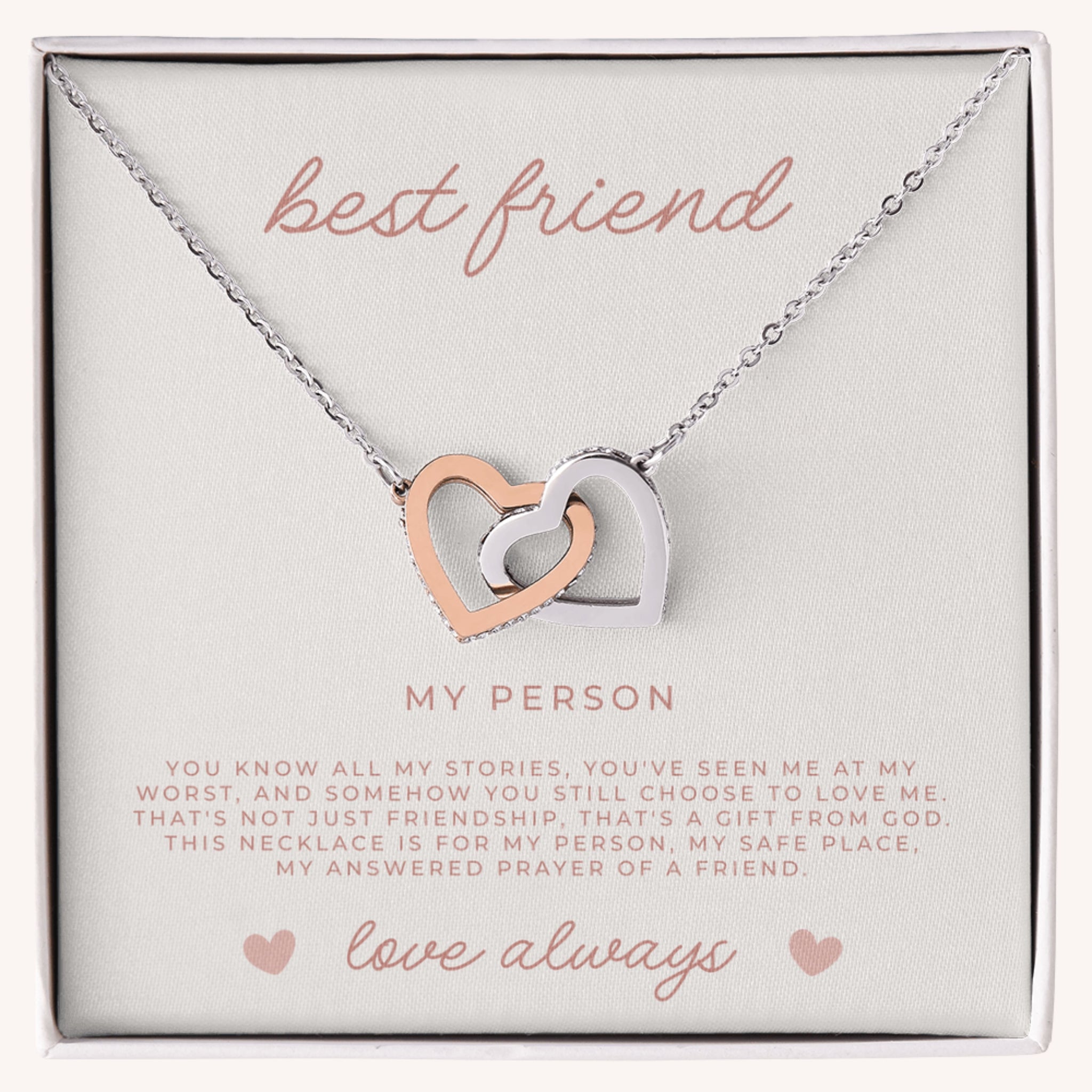 Necklace with interlocking heart pendants on a card with faith filled, message with prayer
