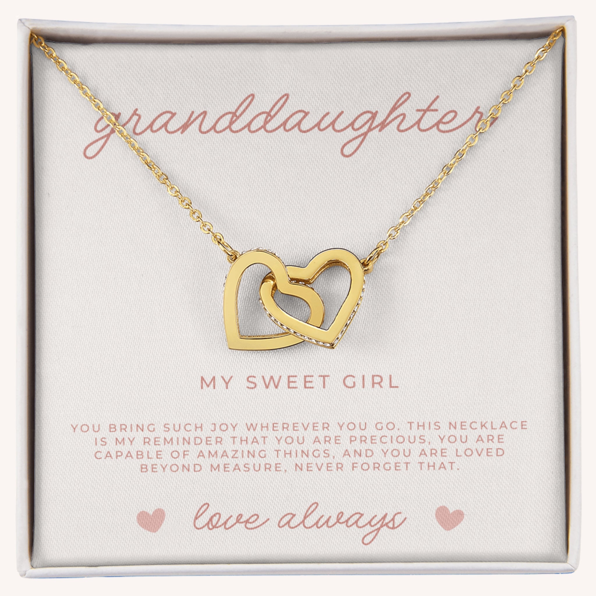 Gold necklace with interlocking hearts in a box with message card reading 'granddaughter' and 'my sweet girl'.