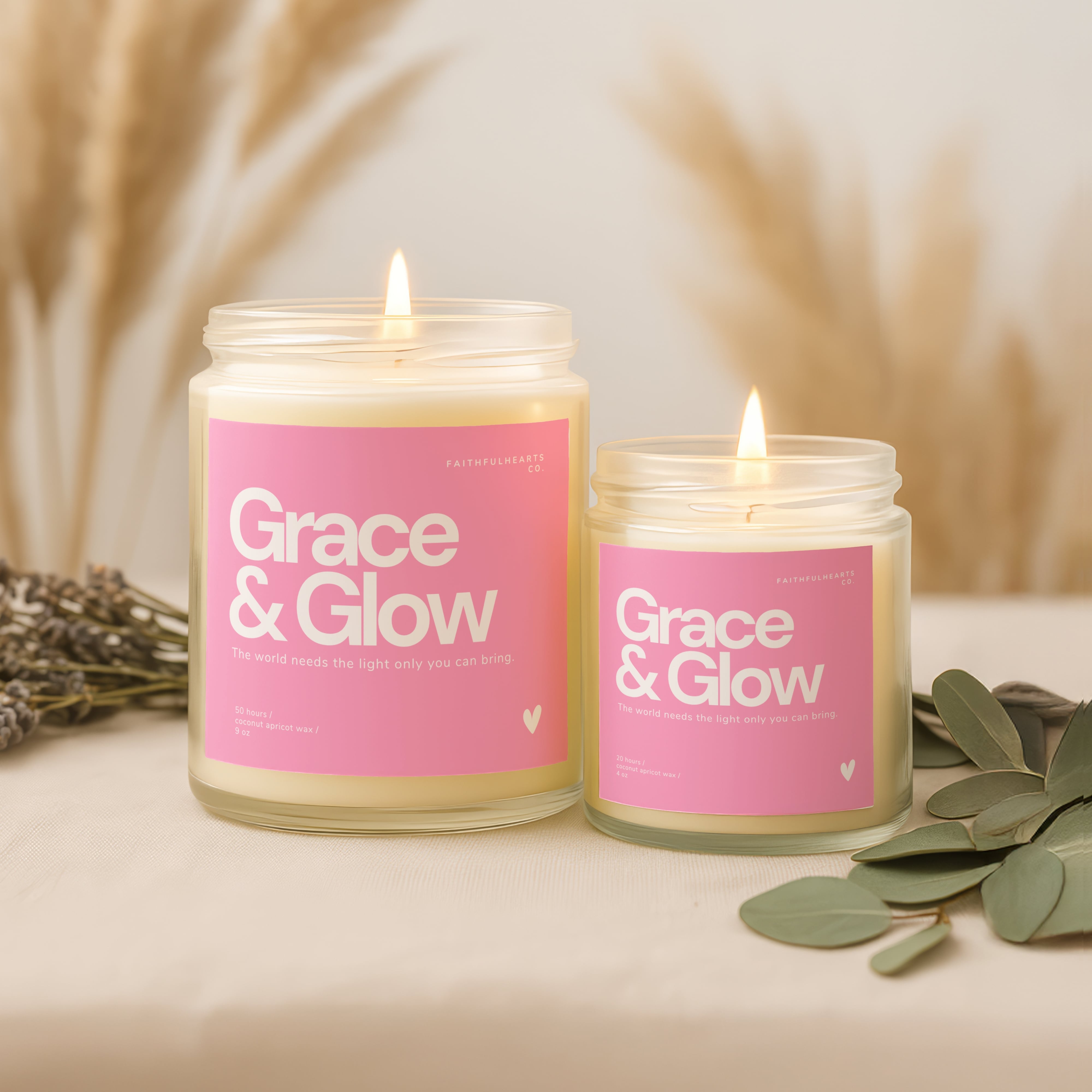 Faith-based Grace & Glow candle in clear jar with pink label, encouraging affirmation gift for women to inspire confidence, calm, and self love.