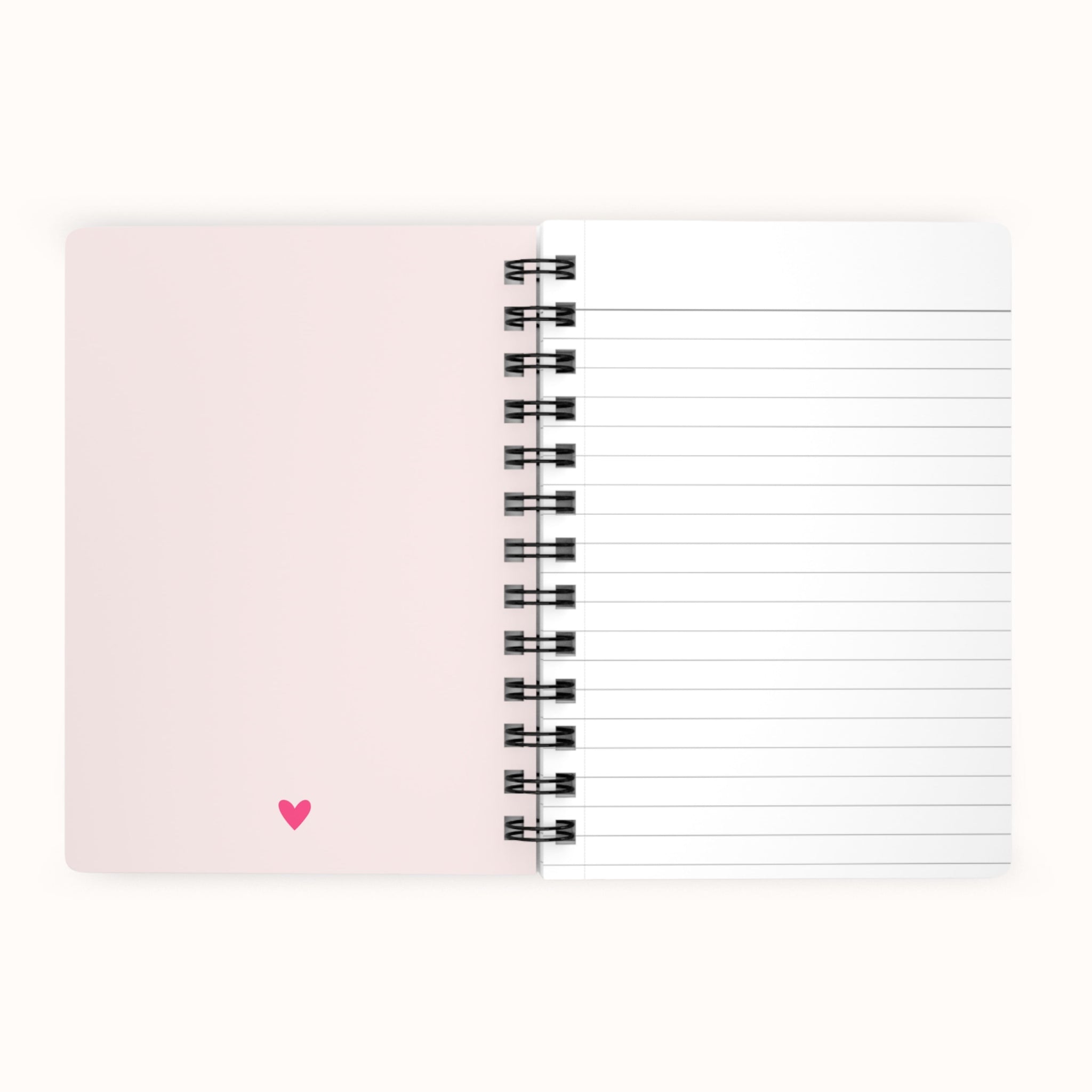 Soft pink inspirational notebook featuring pink heart on the inside page and lined pages