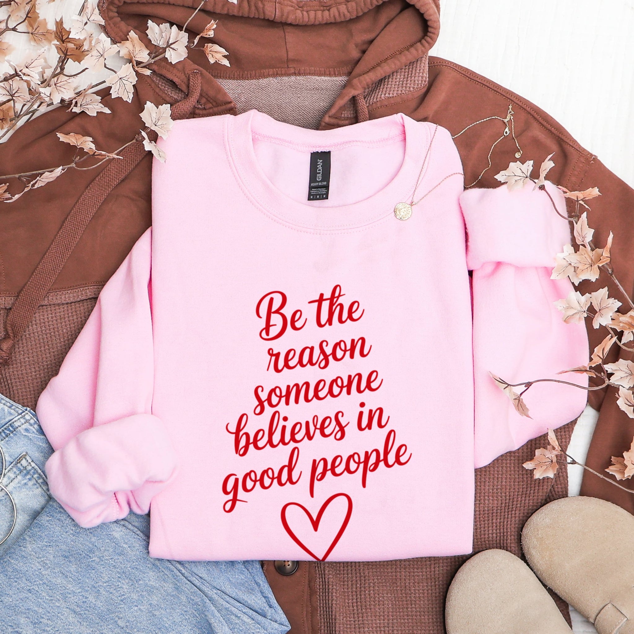 Pink Be The Reason Someone Believes In Good People sweatshirt flat lay - positive message inspirational apparel for women