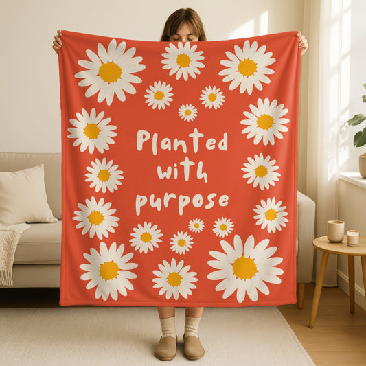 Planted with Purpose blanket in burnt orange terracotta with cream daisy border design, inspirational faith message in cream text, double-sided Christian throw blanket