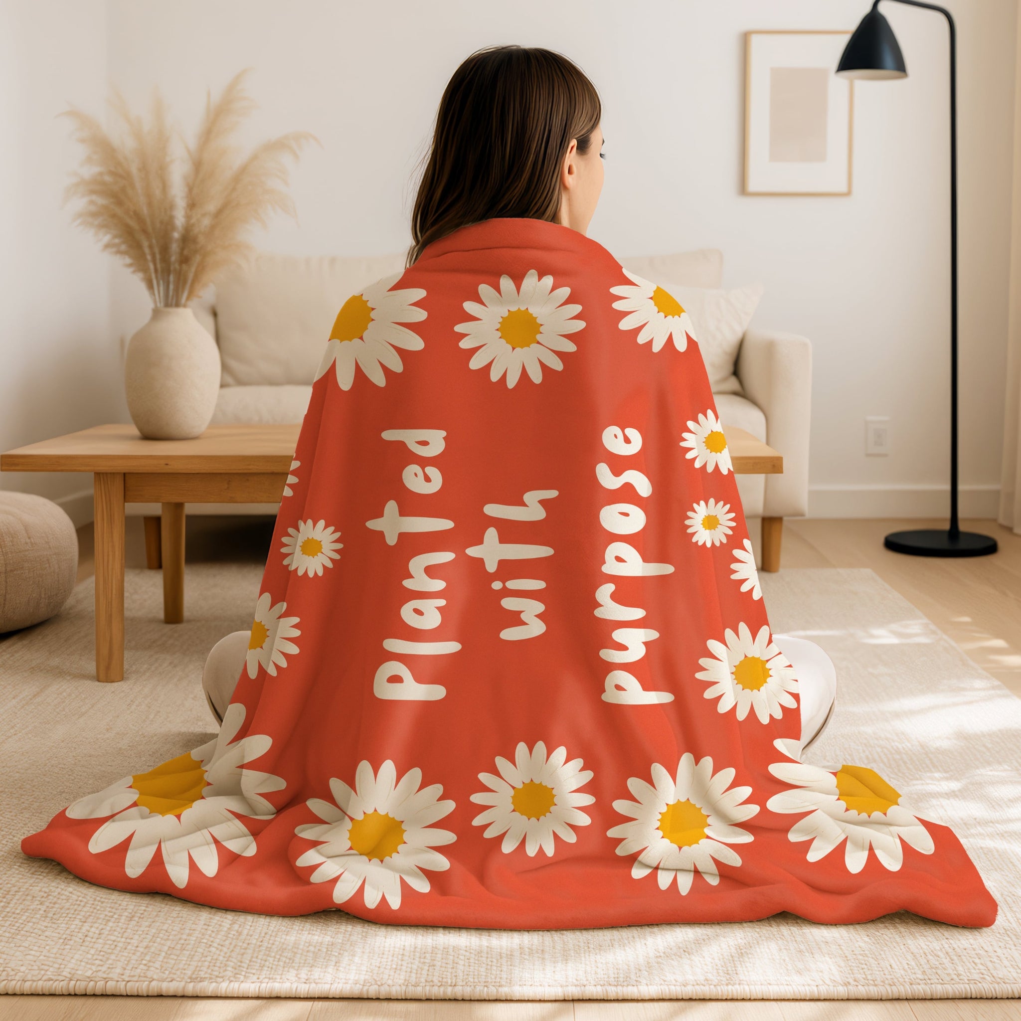 Cozy faith-inspired blanket gift with daisy flowers and encouraging Planted with Purpose quote