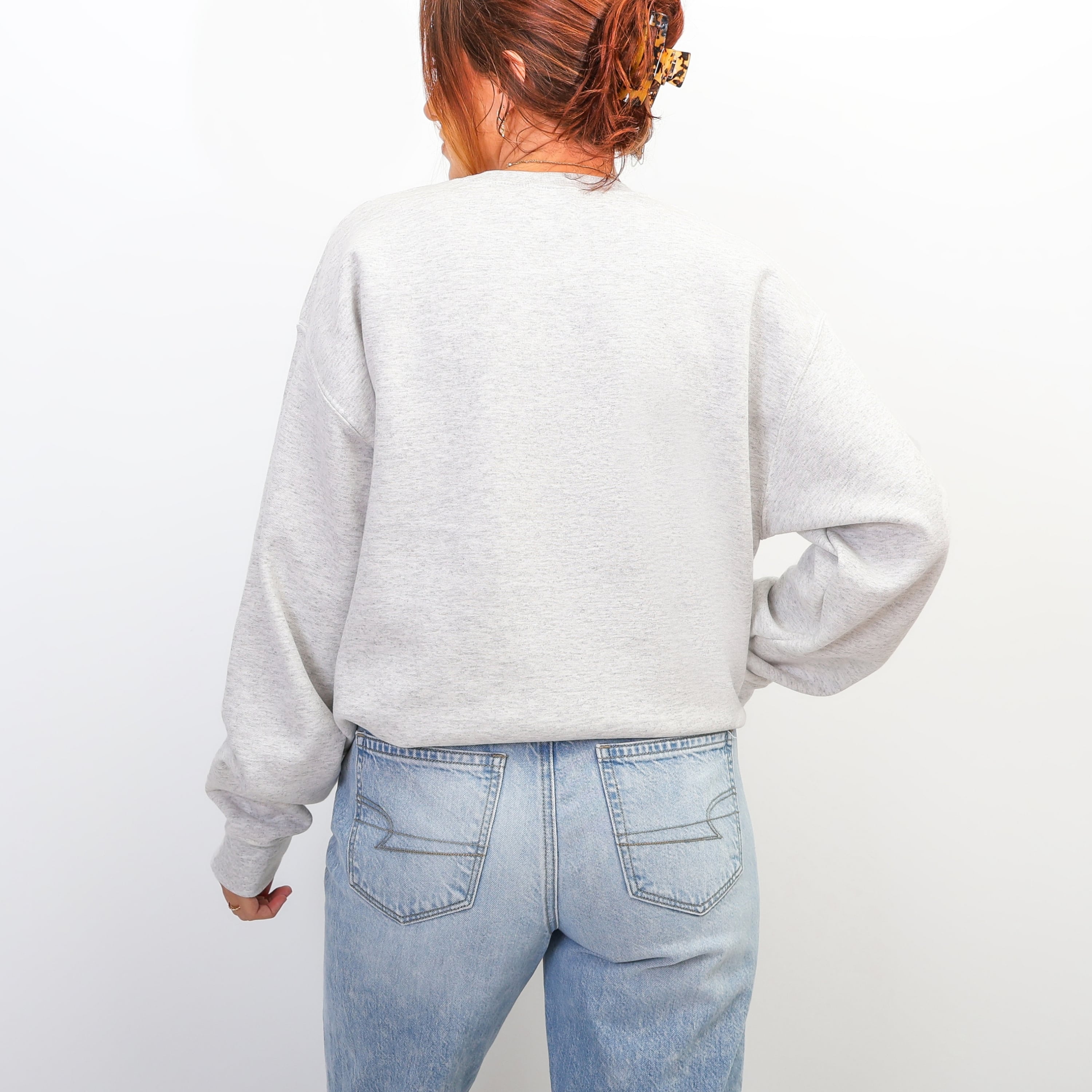 Back view of ash grey Made To Worship sweatshirt - oversized retro Christian crewneck for women