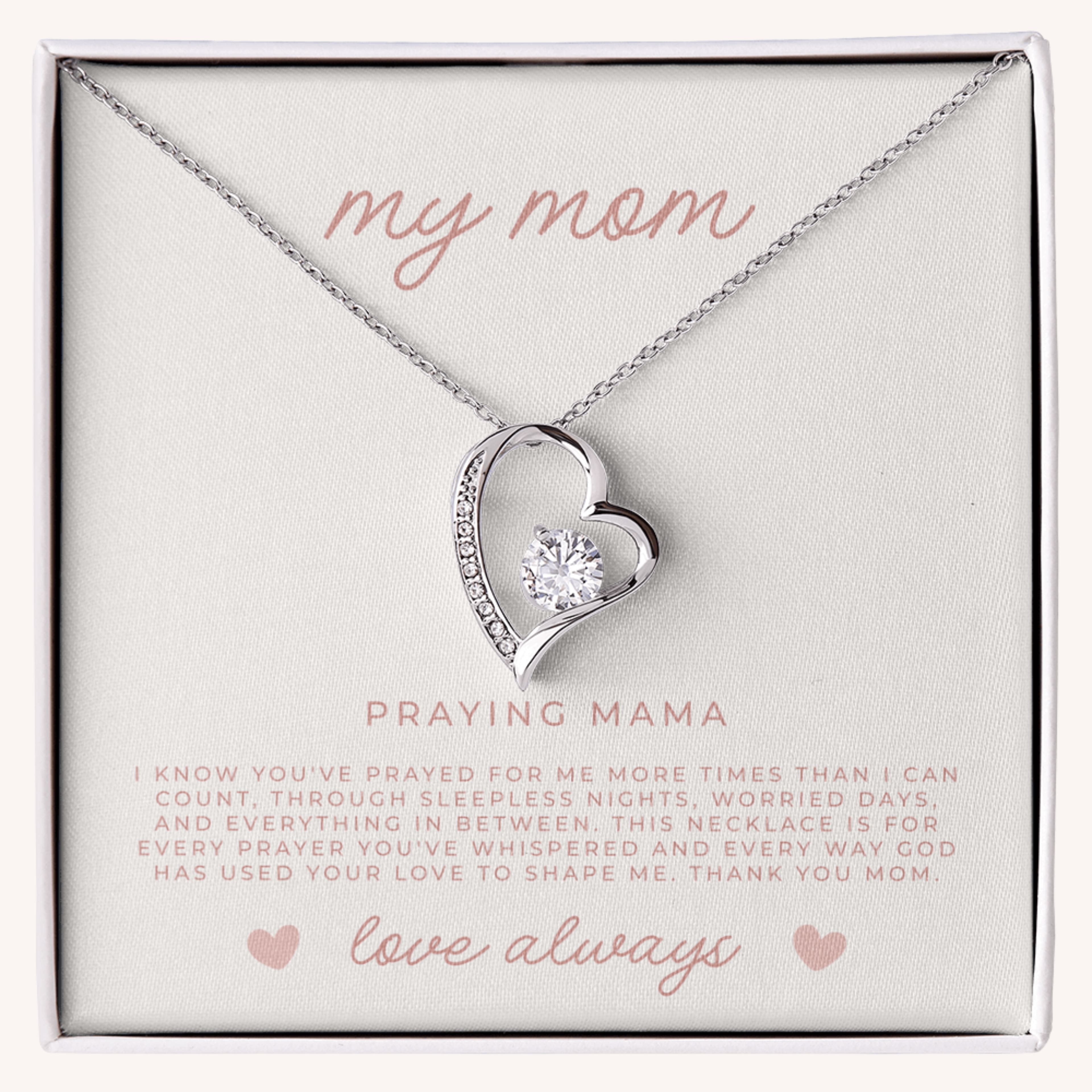 Heart-shaped necklace with a diamond pendant in a gift box with faith message for Christian moms