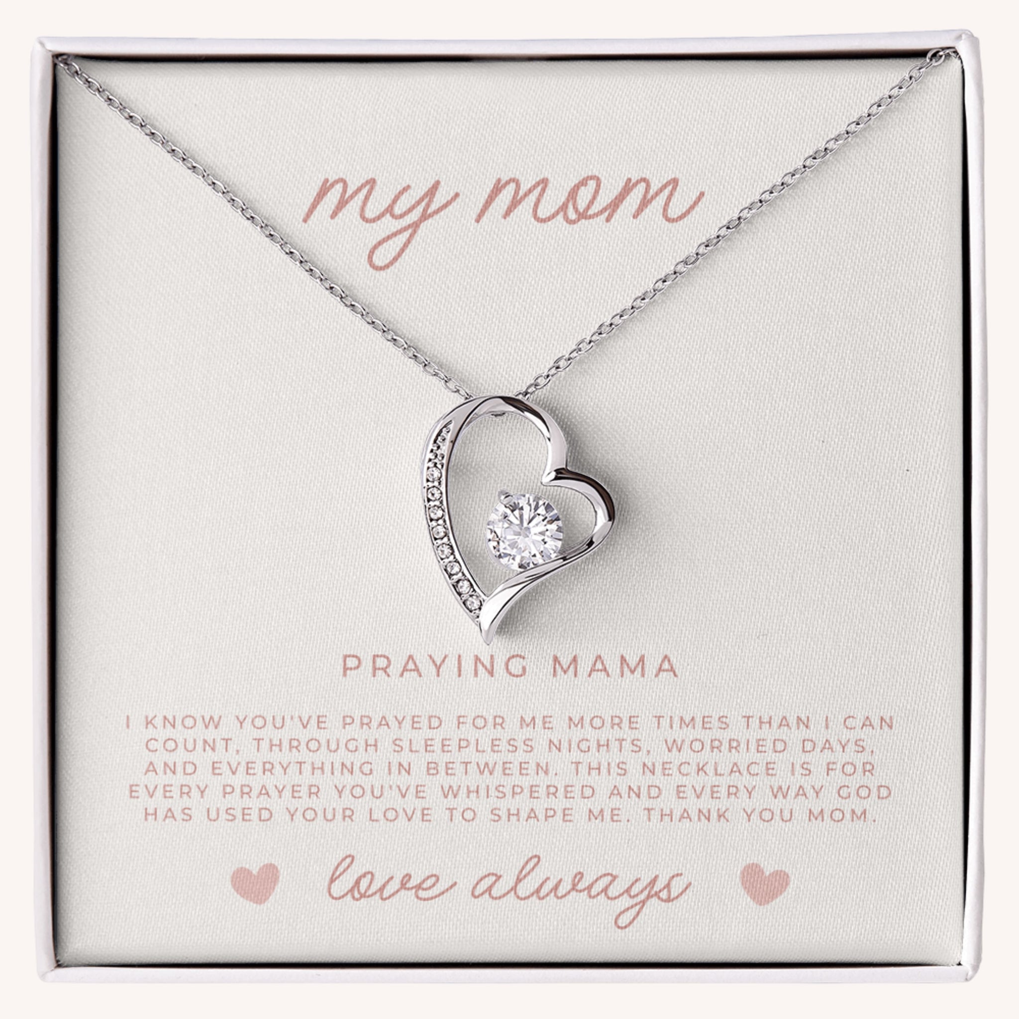 Heart-shaped necklace with a diamond pendant in a gift box with faith message for Christian moms