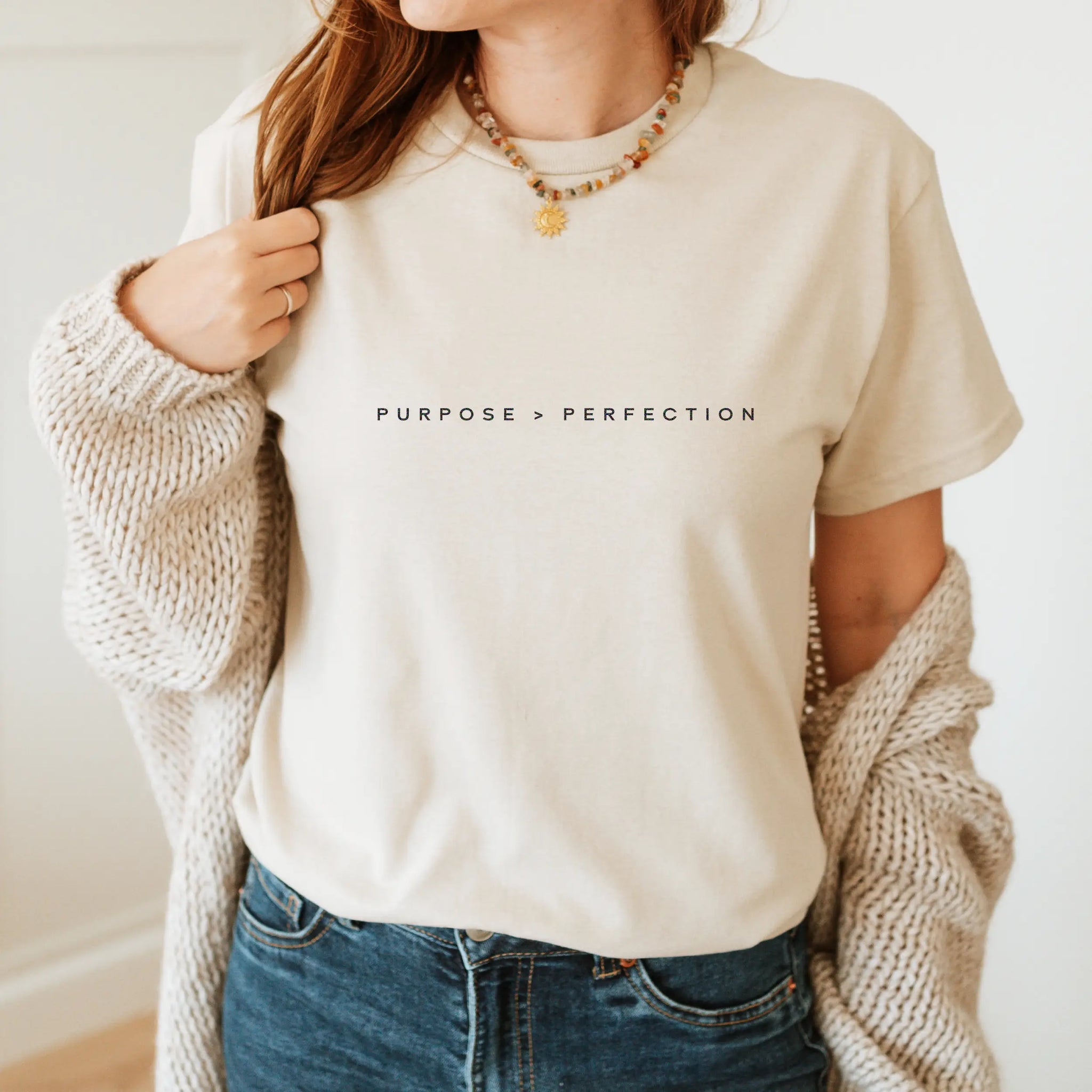 Women’s ivory faith-based T-shirt featuring 