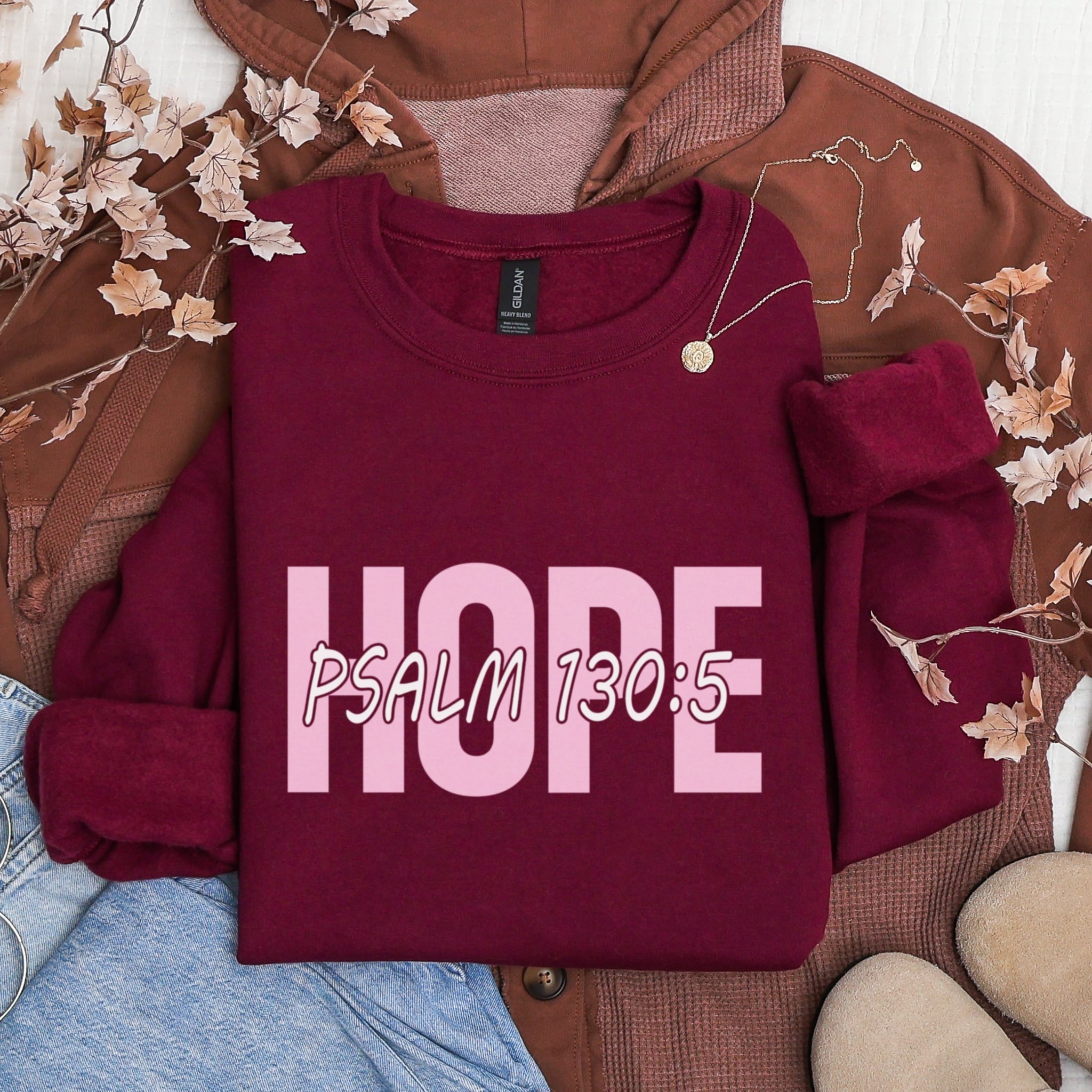 Maroon Hope Psalm 130:5 sweatshirt flat lay with cozy accessories - burgundy Christian scripture apparel for women