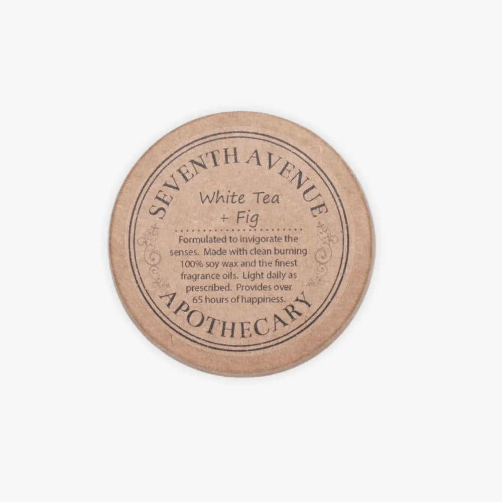 Handmade Soft Life Club candle lid showing seventh avenue apothecary name with scent
