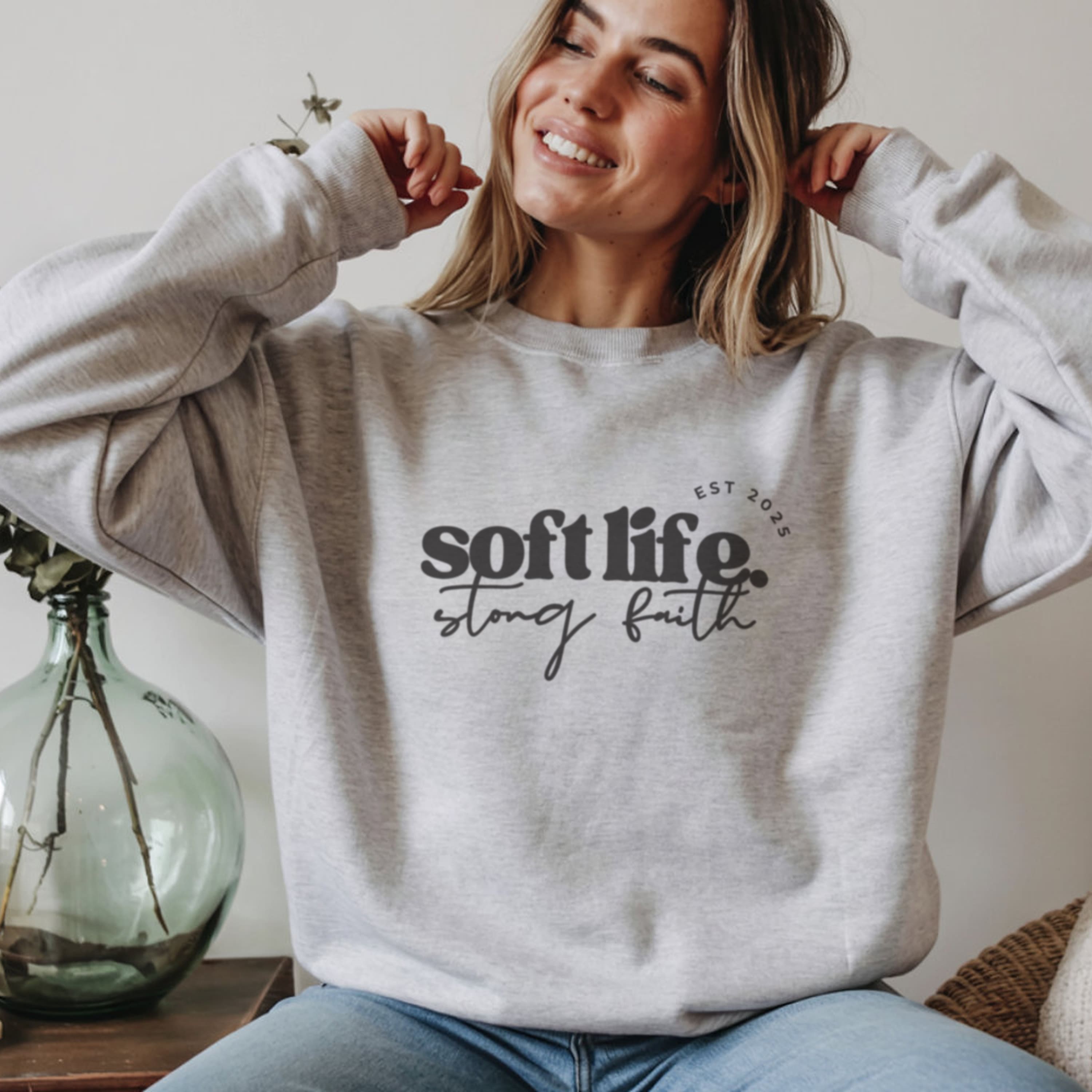 Soft life strong faith sweatshirt in heather grey with minimalist black text, aesthetic Christian crewneck for women