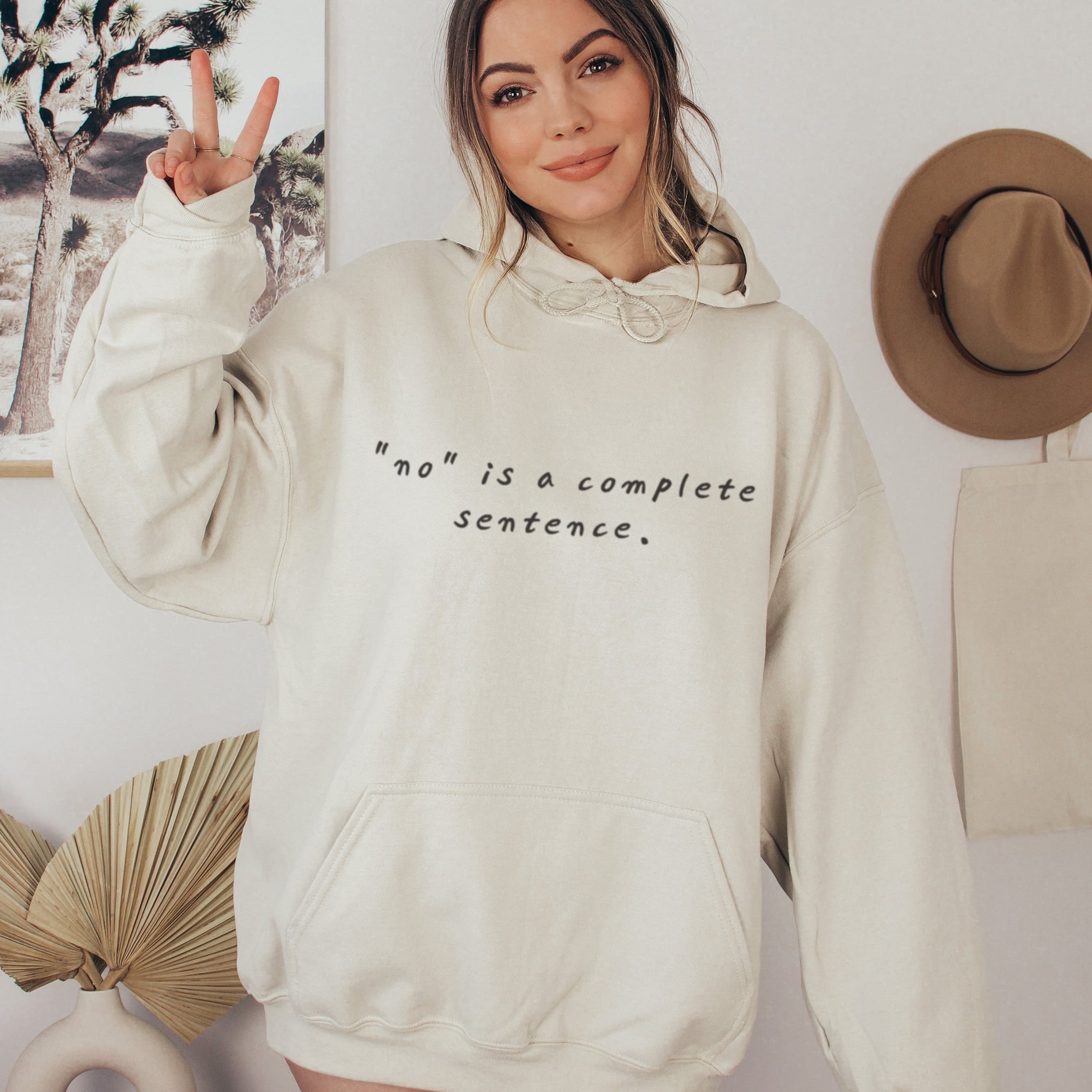 Woman in beige no is a complete sentence hoodie, cozy boundary-setting sweatshirt for soft life era
