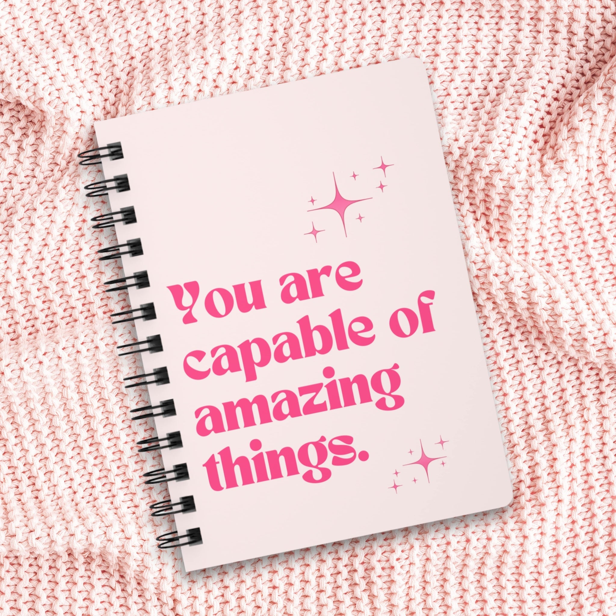 Faithful Hearts Co. pink spiral notebook with sparkles 