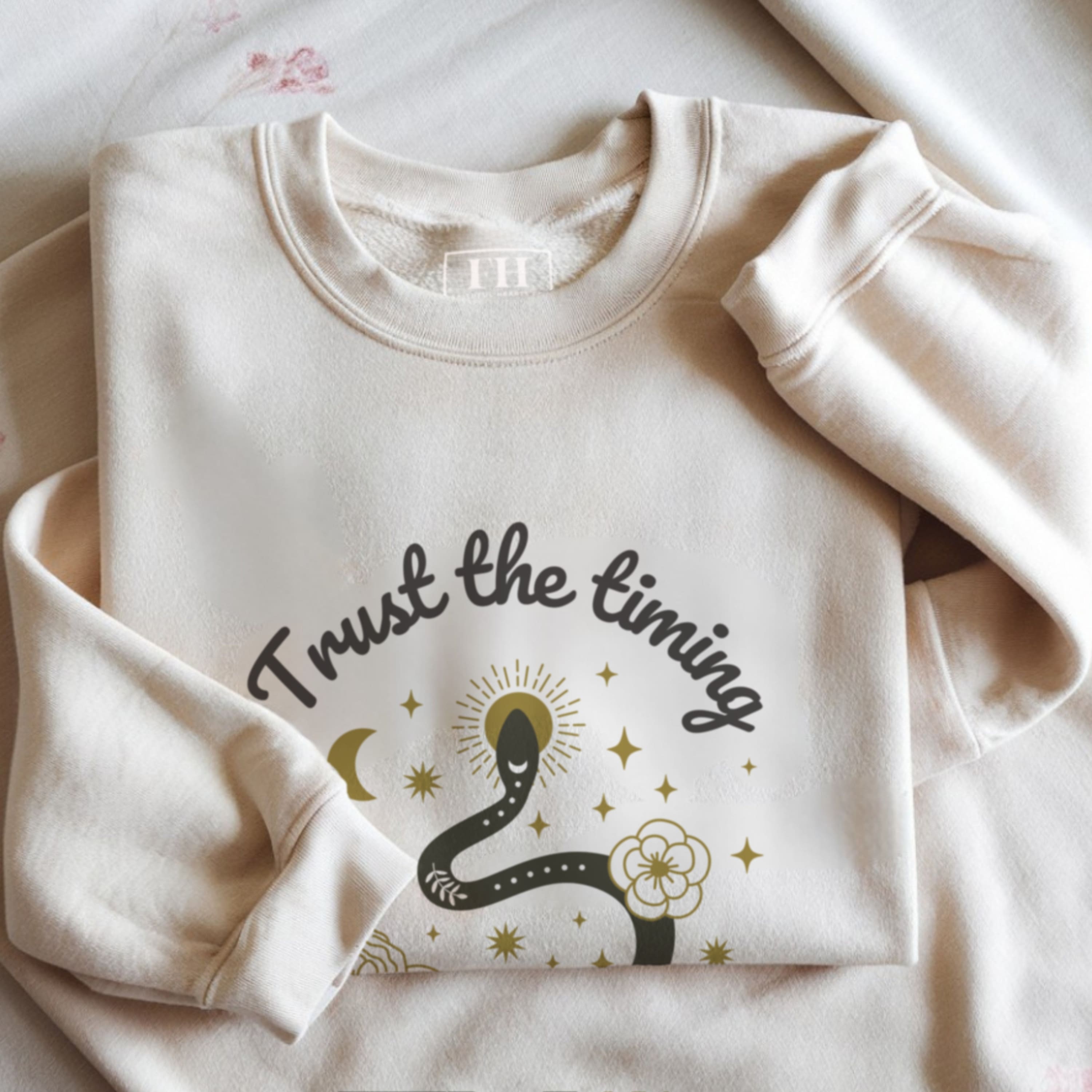 Trust the timing trust the journey spiritual sweatshirt flat lay with mystical boho snake design by Faithful Hearts Co