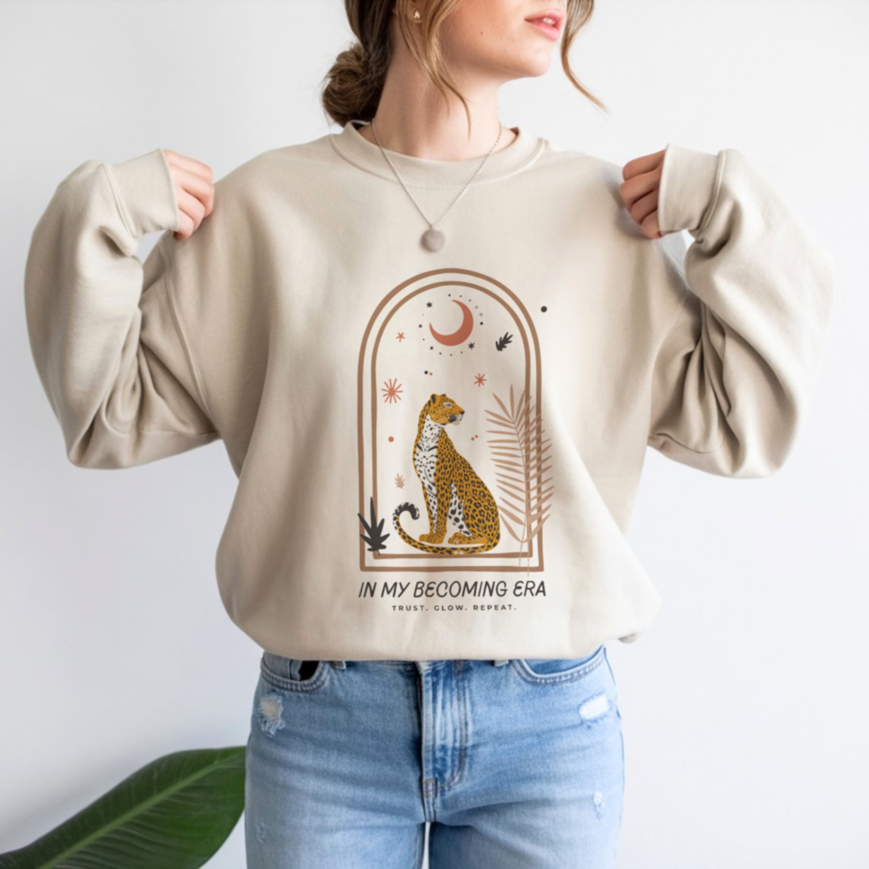 In My Becoming Era sweatshirt in white with boho cheetah arch design, women's spiritual crewneck apparel