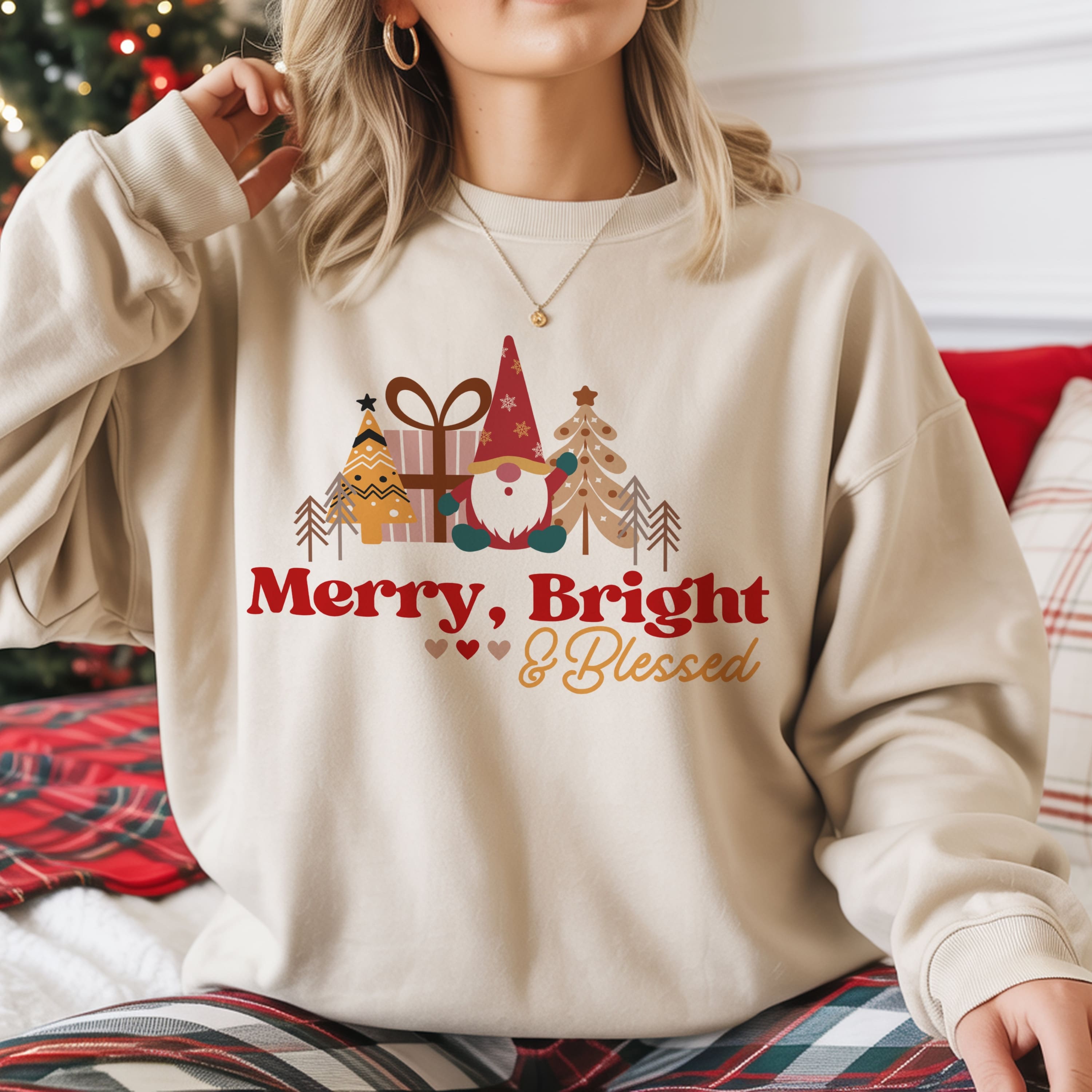 Merry Bright and Blessed text with red and gold lettering, Christmas gnome and holiday graphics on women's faith sweatshirt