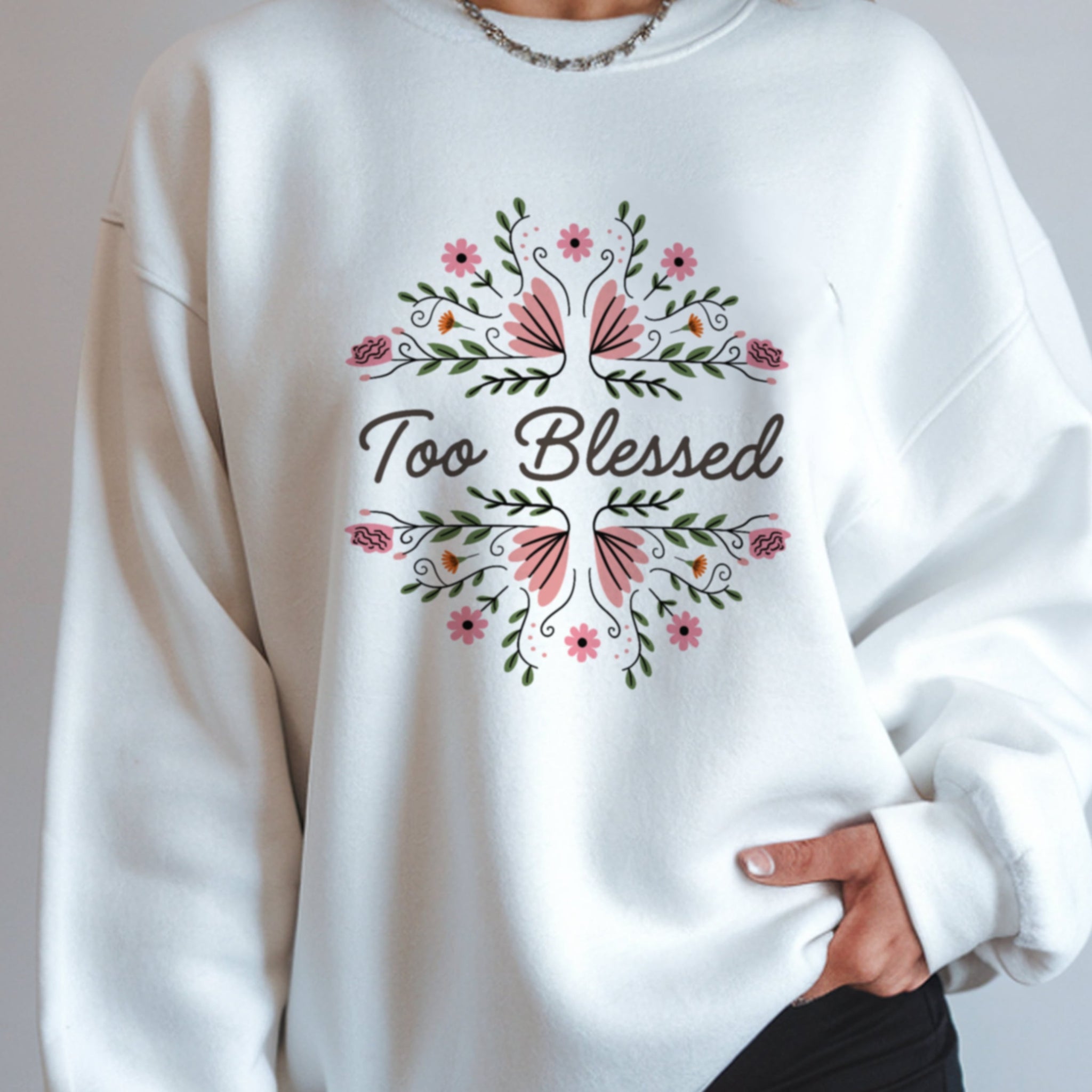 Woman wearing Too Blessed white crewneck sweatshirt front view, gratitude Christian fashion for women embracing blessings